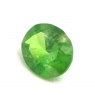 Светло-зелёный уральский демантоид овал, вес 0.46 карат, размер 5.5х4.5мм (dem0039)