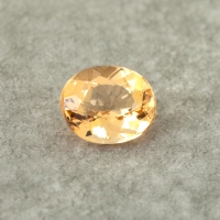 Золотистый топаз империал формы овал, вес 1.23 карат, размер 7.1х5.8мм (imperial0123)