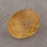 Золотистый топаз империал формы овал, вес 7.1 карат, размер 12.7х10.5мм (imperial0127)