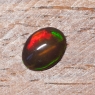 Черный эфиопский опал овал вес 0.87 карат, размер 8.9х6.8мм (opal0729)