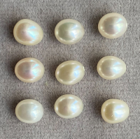 Белый пресноводный жемчуг формы груша-овал, размер 7х5.5 мм (pearl0103)