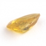 Золотистый сфен триллион вес 0.99 карат, размер 8.3х5.1мм (sphene0030)