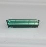 Голубовато-зелёный турмалин формы октагон, вес 2.02 кт, размер 13.5х4.8х3.5 мм (turm0651)