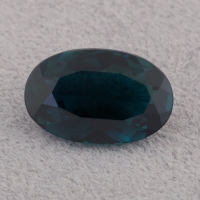Тёмный сине-зелёный турмалин индиголит формы овал, вес 2.7 карат, размер 12х7.8мм (turm0758)