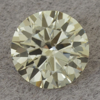 Золотистый циркон точной огранки формы круг, вес 0.89 кт, размер 5.57х5.57x3.5 мм (zircon0253)